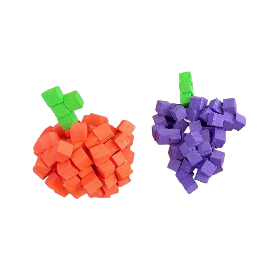 Orange and purple cube-shaped toys with green stems on a white background