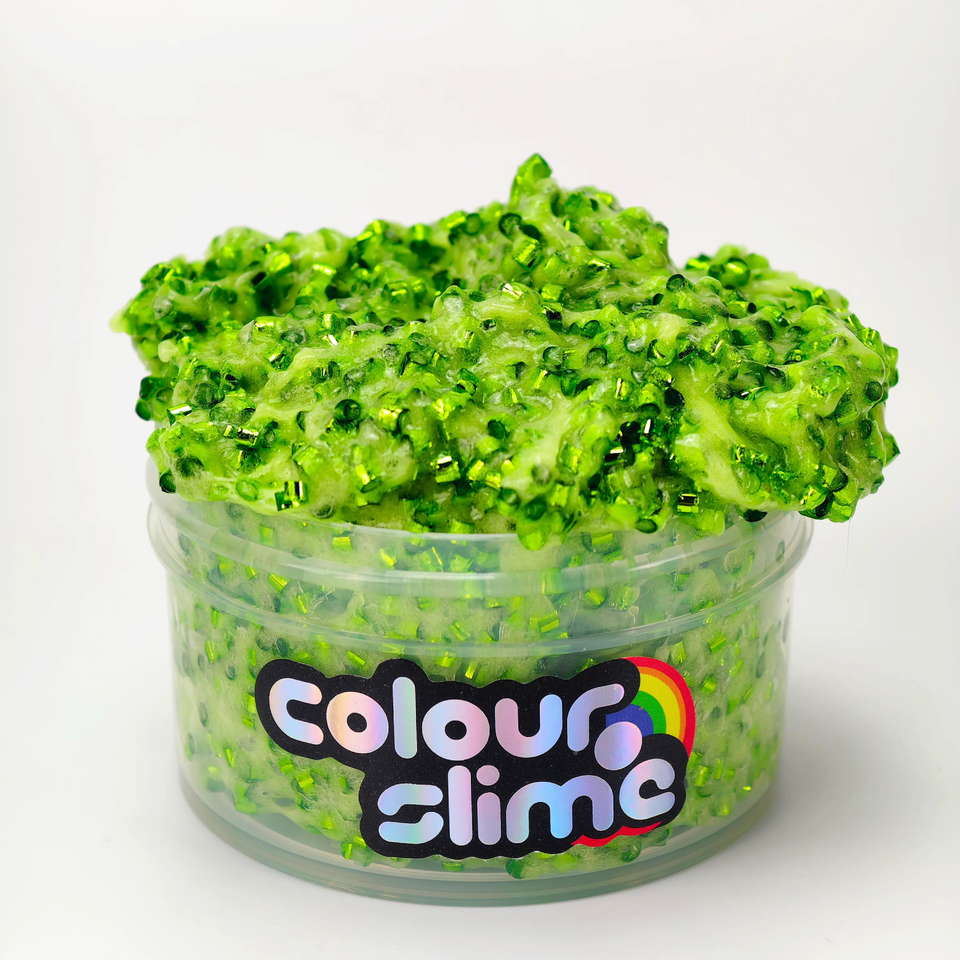 Green slime in a clear container with 'colour slime' branding on a white background