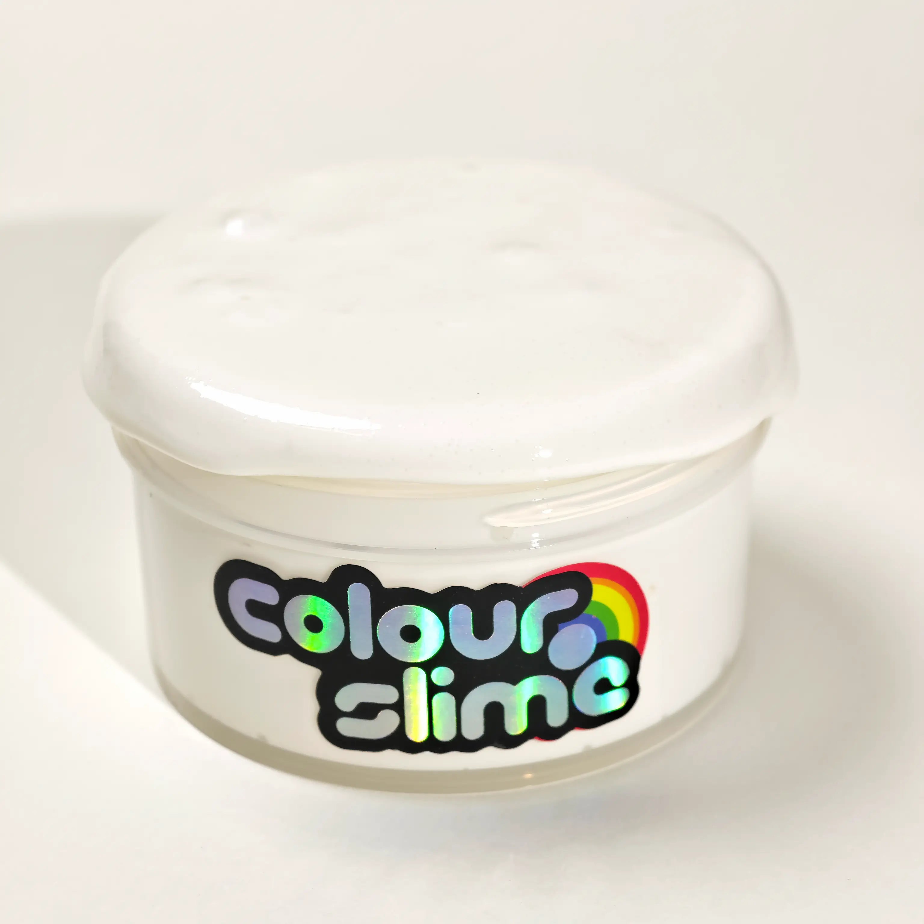 Vanilla Whip white glue slime in a clear jar with a smooth, glossy cream-colored surface